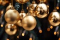 close-up of shimmery gold baubles on a christmas tree