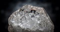 Close-up of shining quartz crystal mineral stone on dark backdrop Royalty Free Stock Photo