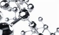 Close-up of a shiny chrome molecule model against a white background Royalty Free Stock Photo