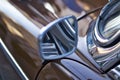 Close up of shiny chrome rear view mirror of classic car Royalty Free Stock Photo