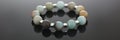 Shiny cute hand bracelet made of semiprecious stones Royalty Free Stock Photo