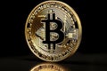 Close up of shiny gold bitcoin cryptocurrency coin with selective focus and blurred background