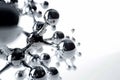 Close-up of a shiny metallic molecule model against a white background Royalty Free Stock Photo