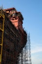 Close up of ship under construction with scaffolding
