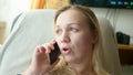 Close up of shocked woman hearing bad news over phone, scared female amazed by negative message received talking on cell Royalty Free Stock Photo