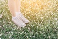 Close-up shoes hipster young girl relaxed time and enjoying nature around in the forest.