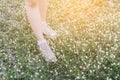 Close-up shoes hipster young girl relaxed time and enjoying nature around in the forest.