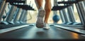 Close up shoes man's muscular legs feet during running on treadmill workout Royalty Free Stock Photo