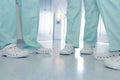 Close up shoes medical team in hospital corridor