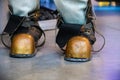 Close-up shoes of an old vintage three-bolt deep-sea diving suit. Suit for deep sea diving of the last century. The Royalty Free Stock Photo