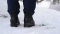 Close-up, shoes and snow on the street in winter, loss and loss of keys, absent-mindedness and inattention. Lose the