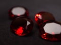 Close up shoot of faceted red diamond like gems