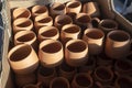 Close-up shoot of handmade pots made in pottery workshop