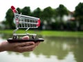 Close up shopping cart on the mobile phone, business in eCommerce concept Royalty Free Stock Photo