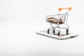 close up Shopping cart on smartphone White background E-commerce Royalty Free Stock Photo