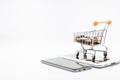 close up Shopping cart on smartphone White background Royalty Free Stock Photo