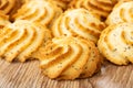 Close up of shortbread cookies with poppy on wooden table