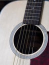 Close up shot of acoustic guitar. Strings, sound hole Royalty Free Stock Photo