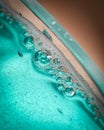 Close up shot of air bubbles in mouth wash liquid.