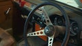 Close-up shot of antique car Triumph steering wheel