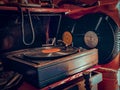 Close up shot of an antique vinyl record player and disks - a vintage concept Royalty Free Stock Photo