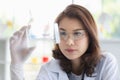 Scientist holding test tube tray in her hand Royalty Free Stock Photo