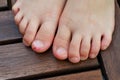 Close up shot of bad behavior or habit of biting toes. Refer as stress, anxiety, worry and health issue. All kids toes are bitten