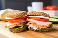 a close-up shot of a bagel and lox sandwich