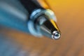 Close up shot of ball point pen under light shade Royalty Free Stock Photo