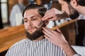 close-up shot of barber shaving man Royalty Free Stock Photo