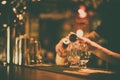 Bartender pouring whisky in a glass Royalty Free Stock Photo