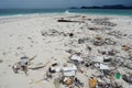 A close up shot of the beach that is dirty with sea garbage Royalty Free Stock Photo