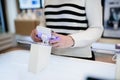 Young woman in smart phone shop