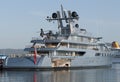 Close-up shot of a big yacht with a helicopter at the port of Olbia, Italy