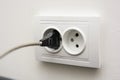 Close up plug in the socket Royalty Free Stock Photo