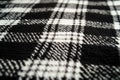 A close-up shot of a black and white checkered blanket with detailed texture and pattern Royalty Free Stock Photo