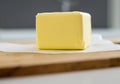 block of butter on a chopping board