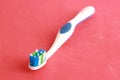 Close up shot of a blue and green white toothbrush Royalty Free Stock Photo