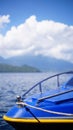 Close-up shot of a blue speedboat detail against a crystal clear blue sky Royalty Free Stock Photo