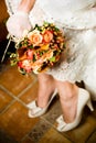 Close-up shot of bride holding bouquet