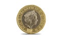 A close-up shot of the British one pound coin over a white background Royalty Free Stock Photo