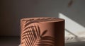 Close-up of a brown cylindrical object with leaf shadows Royalty Free Stock Photo