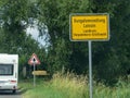 Close-up shot of a Bungalowsiedlung Lossin city entrance sign