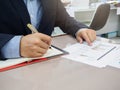 Businessman writing notes on notebook Royalty Free Stock Photo