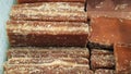 Close-up shot of cane candy. A pile of pieces of sugar are displayed for sale in the supermarket.