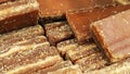 Close-up shot of cane candy. A pile of pieces of sugar are displayed for sale in the supermarket.