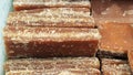 Close-up shot of cane candy. A pile of pieces of sugar are displayed for sale in the supermarket.