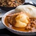 Close-Up Shot of Ghanaian Fufu with Soup and Vegetables