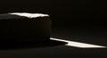 Dramatic sunbeam highlights a rough geometric stone Royalty Free Stock Photo