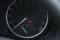 Close up shot of a car dashboard with the battery icon lit. Royalty Free Stock Photo